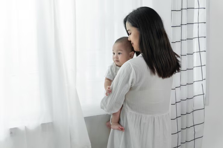 menggendong bayi, bayi manja, mitos parenting, fakta tentang bayi, tips ibu muda, ikatan emosional bayi, parenting modern, perkembangan bayi, gendongan bayi, pelukan ibu